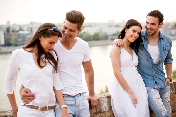 Young people on the waterfront — Stock Photo, Image