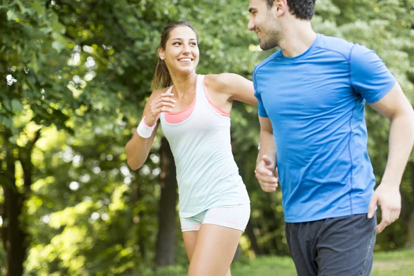 Young couple running Stock Photo