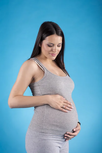 Mujer embarazada joven — Foto de Stock