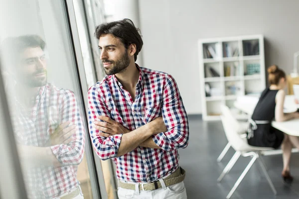 Young man in the office — Stock Photo, Image