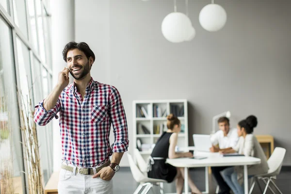 Young man in the office — Stock Photo, Image