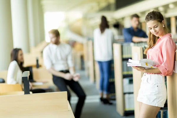 Young woman in the library