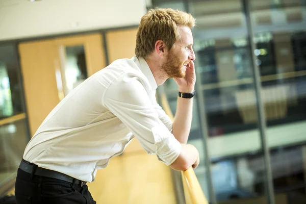 Young man with mobile phone — Stock Photo, Image