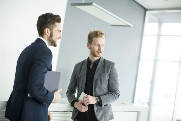 Young men in the office — Stock Photo, Image