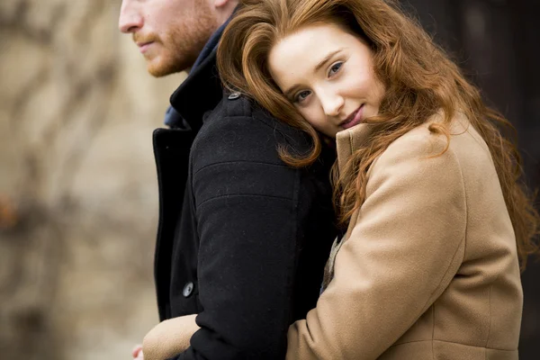 Couple at autumn park — Stock Photo, Image