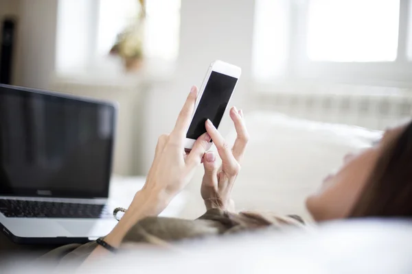 Young woman with phone — Stock Photo, Image