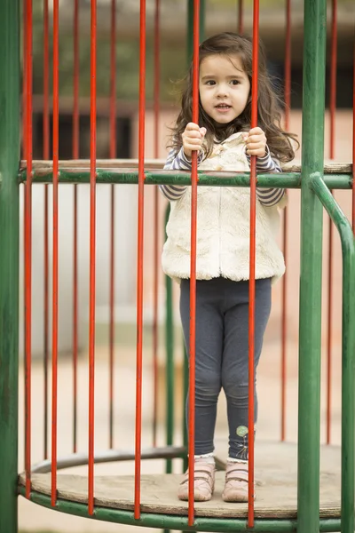 Menina no parque infantil — Fotografia de Stock