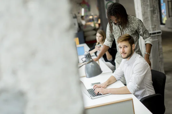 Young people in the office — Stock Photo, Image