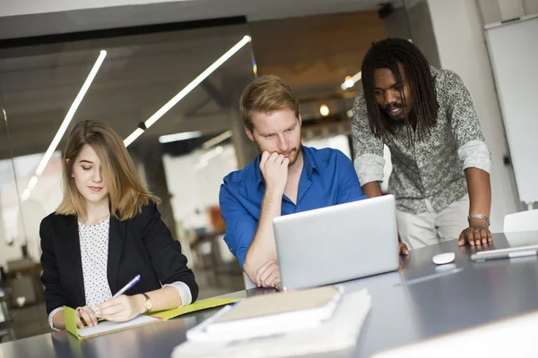 Young people in the office — Stock Photo, Image