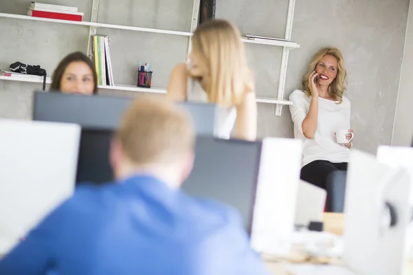 Young people in the office — Stock Photo, Image