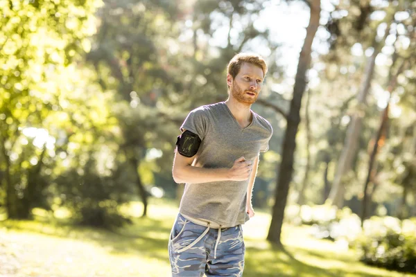 Young man running — Stock Photo, Image