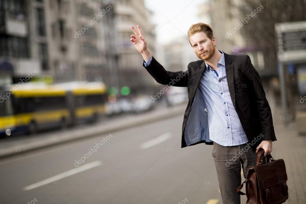 Man waiting taxi Stock Photo by ©boggy22 86389948