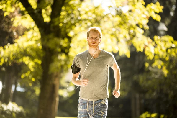 Young man running — Stock Photo, Image