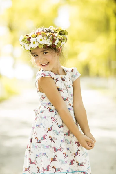 Little girl in the summer park — Stock Photo, Image