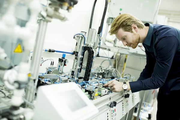 Engineer while working in the factory — Stock Photo, Image