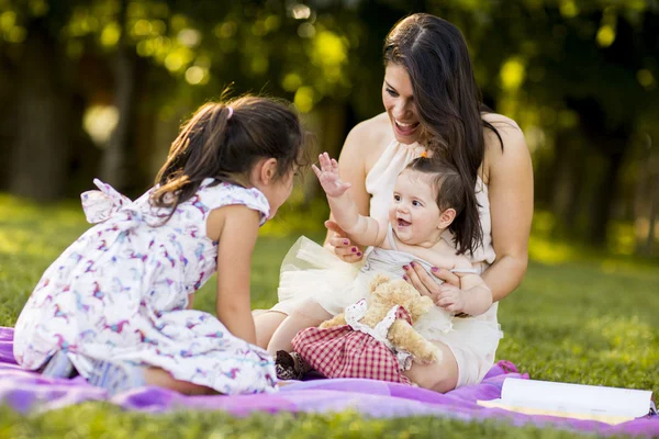 Mother with two girls — Stock Photo, Image