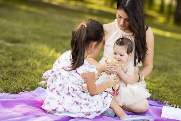 Mother with two girls — Stock Photo, Image