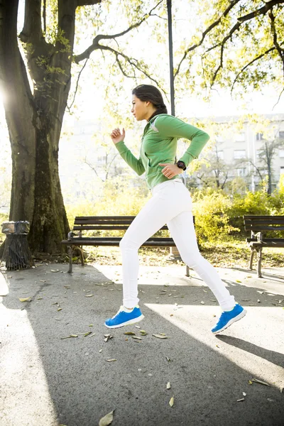 Young woman running — Stock Photo, Image