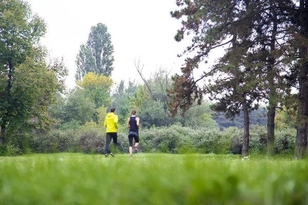 People running in the park — Stock Photo, Image