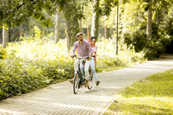 Young couple on bicycle — Stock Photo, Image
