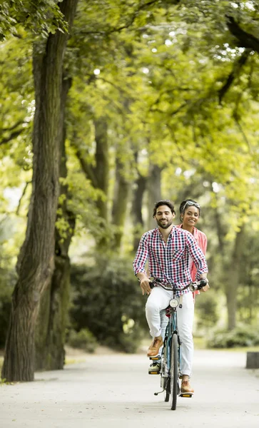 Young couple on bicycle — Stock Photo, Image