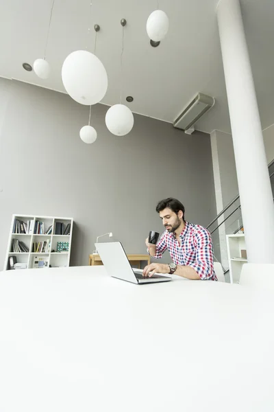 Young man in the office — Stock Photo, Image