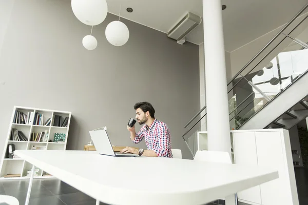 Young man in the office — Stock Photo, Image