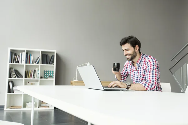 Young man in the office — Stock Photo, Image