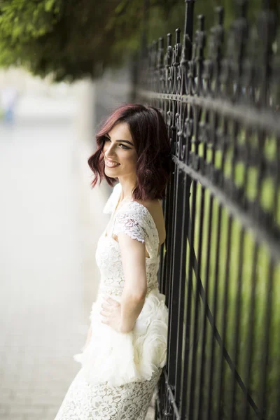 Young woman in white drress — Stock Photo, Image