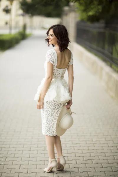 Young woman in white drress — Stock Photo, Image