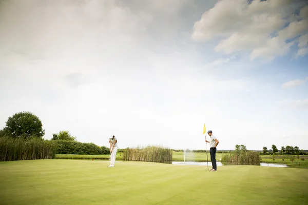 Couple au terrain de golf — Photo