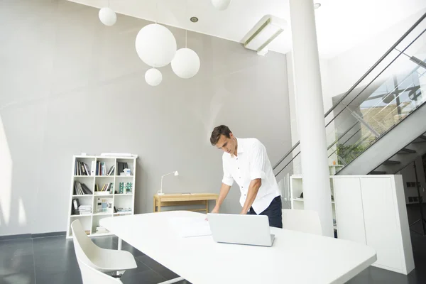 Young man in the office — Stock Photo, Image