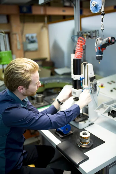 Engineer while working in the factory — Stock Photo, Image