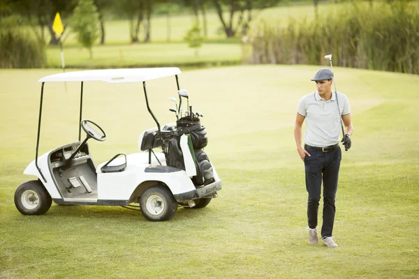 Casal no carrinho de golfe — Fotografia de Stock