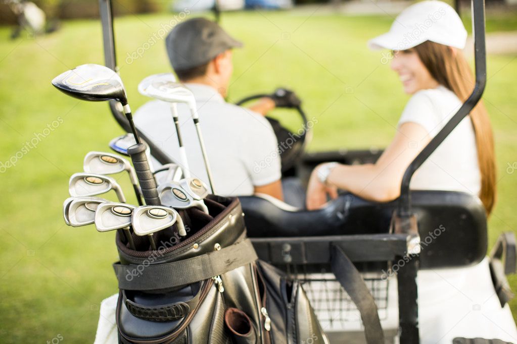 Couple at golf cart