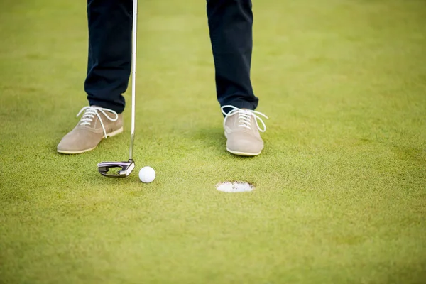 Boy's legs on green grass — Stock Photo, Image