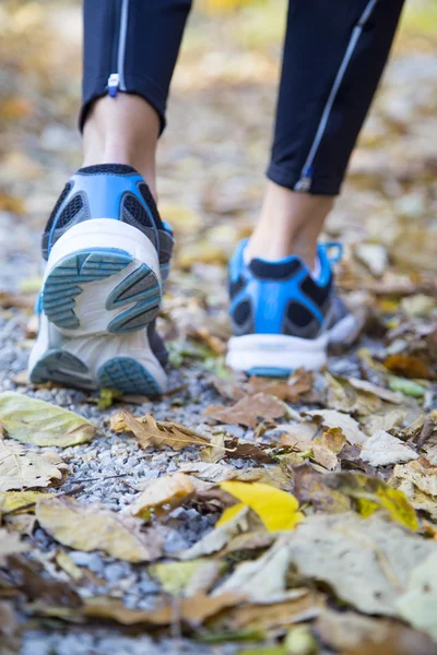 Running feet of young woman — Stock Photo, Image