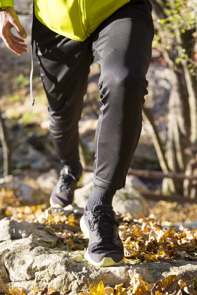 Running feet of young woman