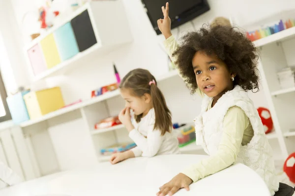 Liitle girls at playroom — Stock Photo, Image