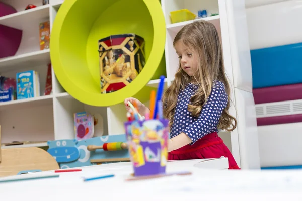 Little girl at playroom — Stock Photo, Image