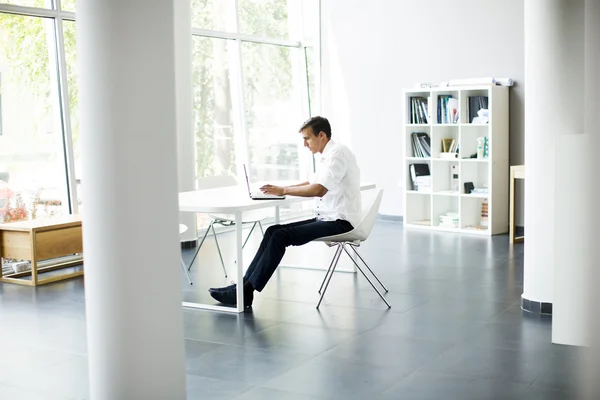 Young man in the office — Stock Photo, Image