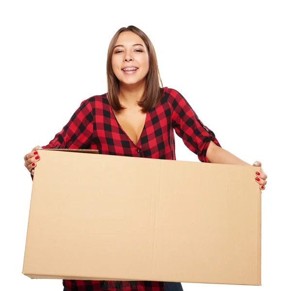 Young woman carrying cardboard box — Stock Photo, Image