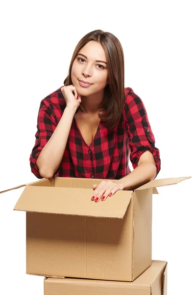 Young woman with cardboard boxes — Stock Photo, Image