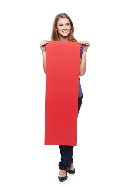 Mujer sosteniendo cartón rojo en blanco —  Fotos de Stock