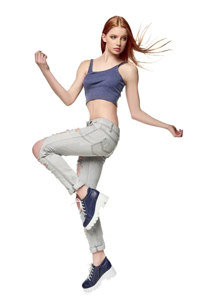 Hip-hop style teenage girl jumping dancing — Stock Photo, Image