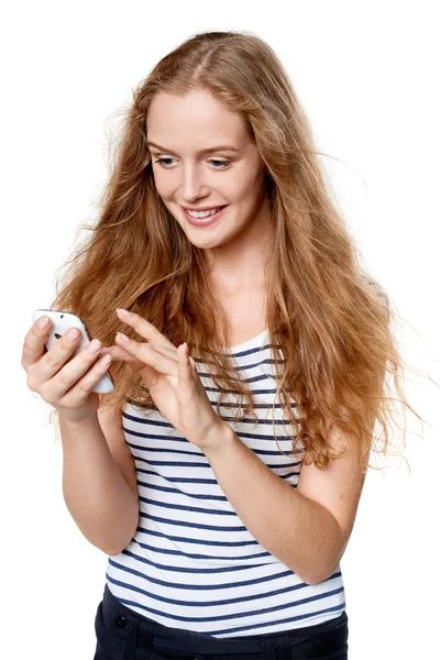 Kobieta SMS-y na jej telefon komórkowy — Zdjęcie stockowe