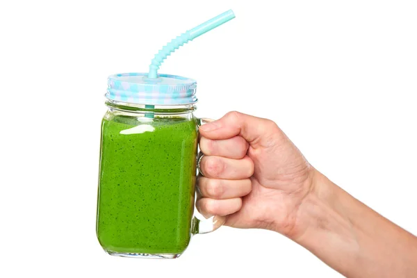 Emberi kezében üveg poharat bögre zöld turmix — Stock Fotó