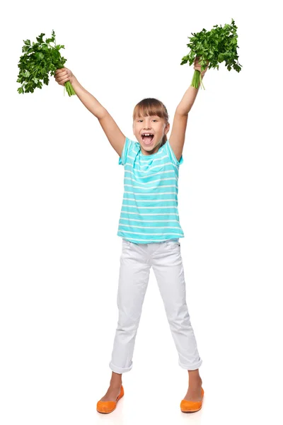 Taze maydanoz sevinç çığlıkları gösterilen gülümseyen küçük kız — Stok fotoğraf