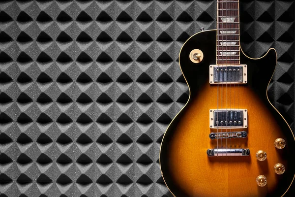 Sunburst Electric Guitar Acoustic Foam Panel Background Copy Space Left — Stock Photo, Image
