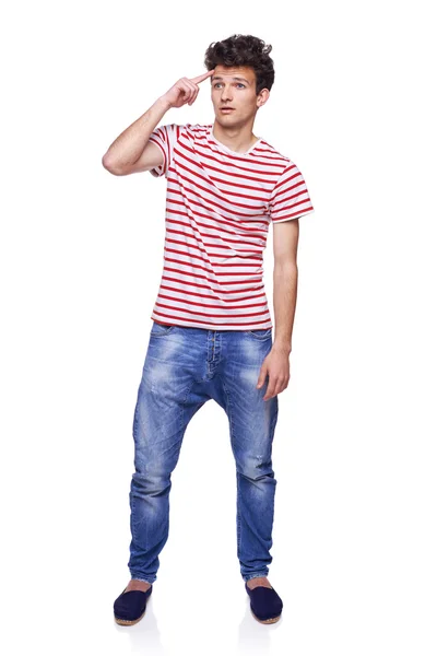 Full length young man looking skeptically — Stock Photo, Image